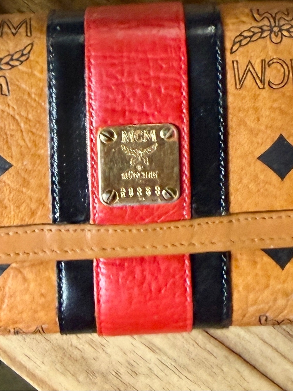 MCM Tricolor Logo Leather Bifold Wallet — Tan, pearlescent Red & Black